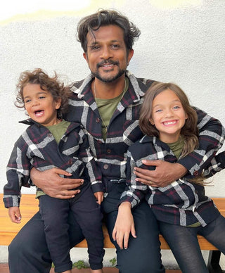 Utkarsh Ambudkar wearing matching shirts from MANCUB with his kids
