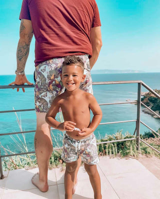 Dad & Son wearing MANCUB matching swim shorts - Birds of a Feather Print