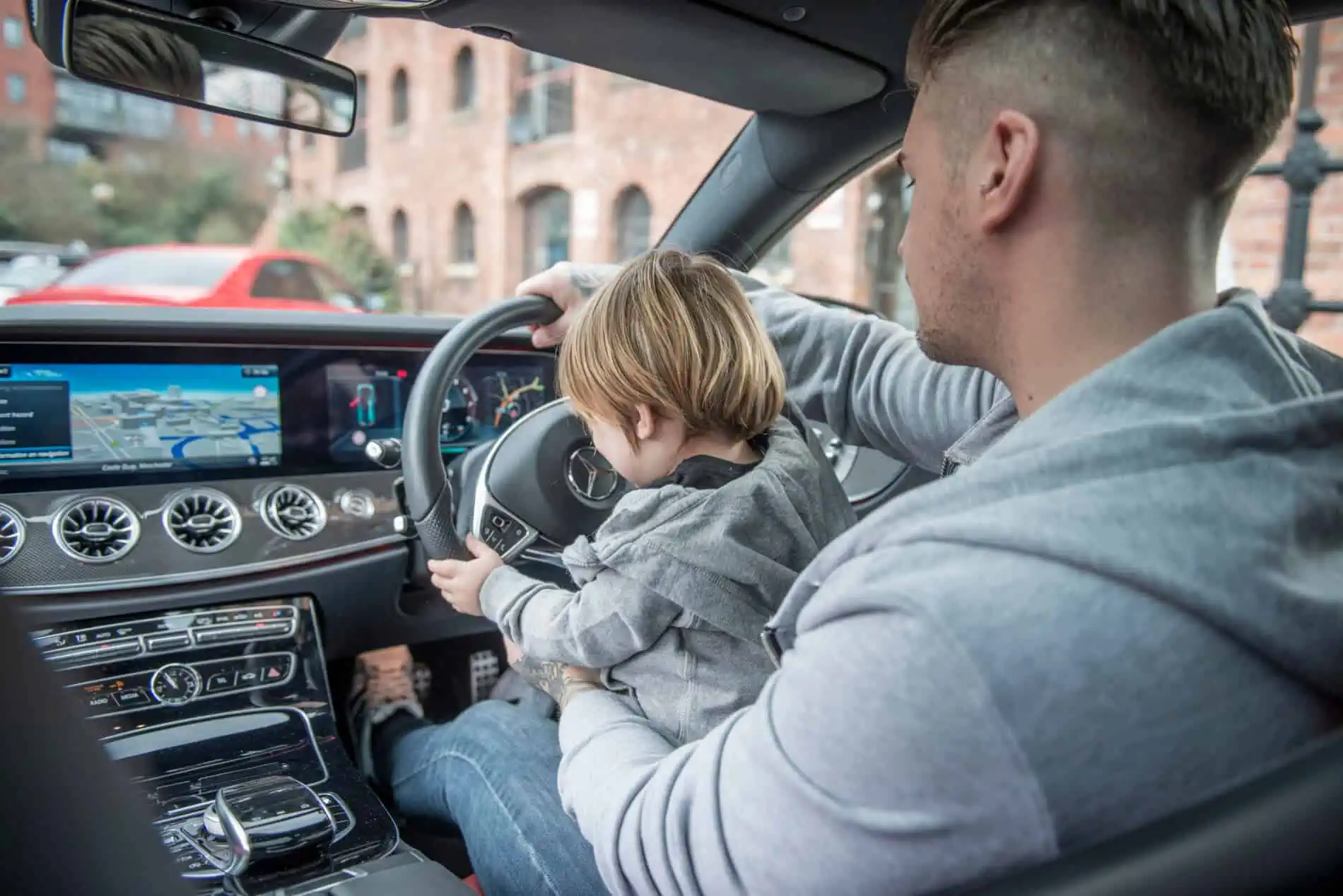 MANCUB Uncle and nephew driving Mercedes 