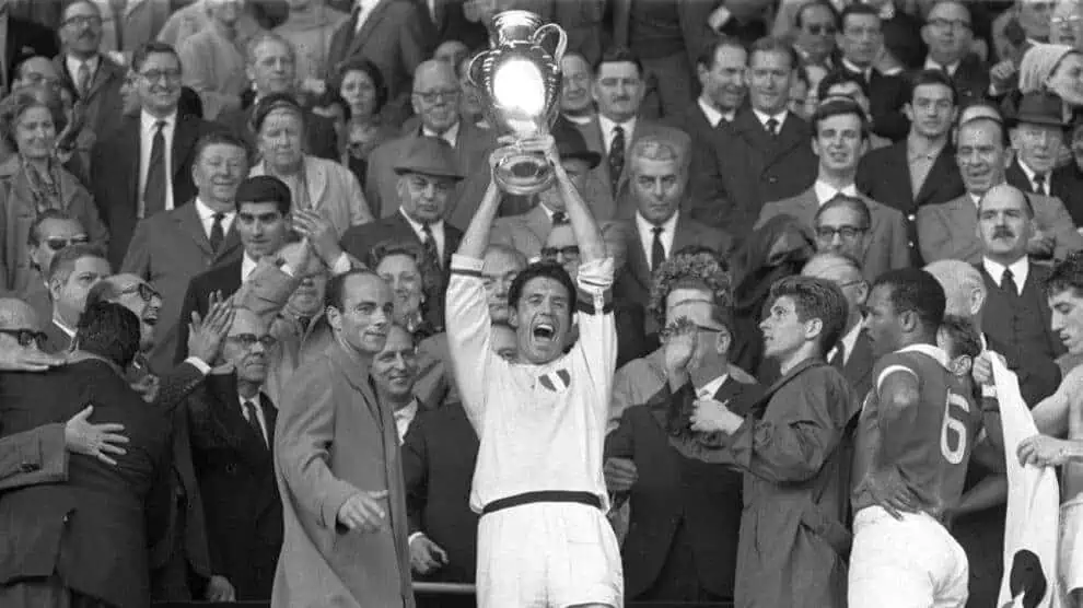 Like father like son - Cesare Maldini celebrating a trophy win for Milan like his son would do many years later