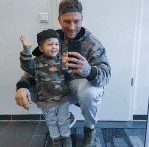 Father and son in matching joggers