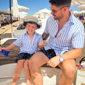 Father & Son Wearing Matching Striped Linen Shirts