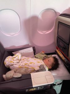 Window seat baby sleeping